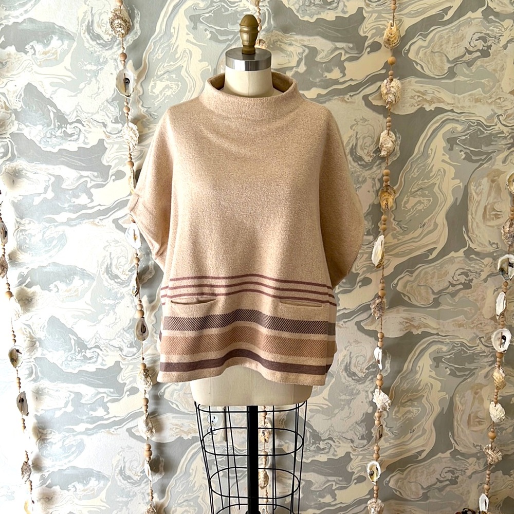Mint condition poncho. 3 season stunner!!